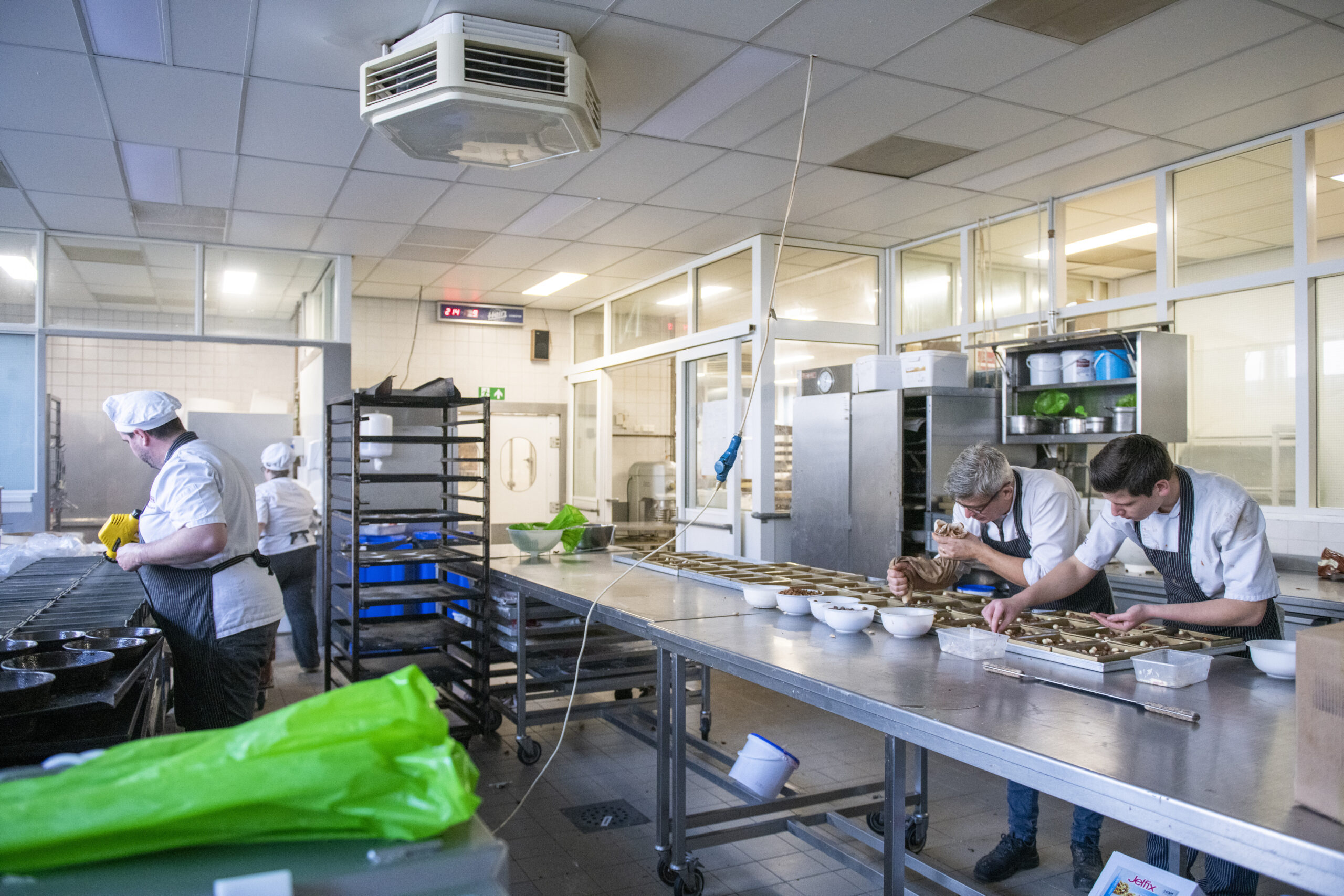 chefs preparing food in a commercial kitchen with 2025 04 04 22 20 32 utc